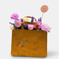 Bouquet Candle in roestige handtas